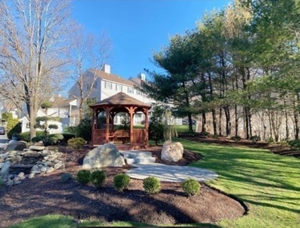 2 Countryside Lane, Unit 1301 Salem, MA 01970 - Photo 35 of 37 a front view of a house with garden