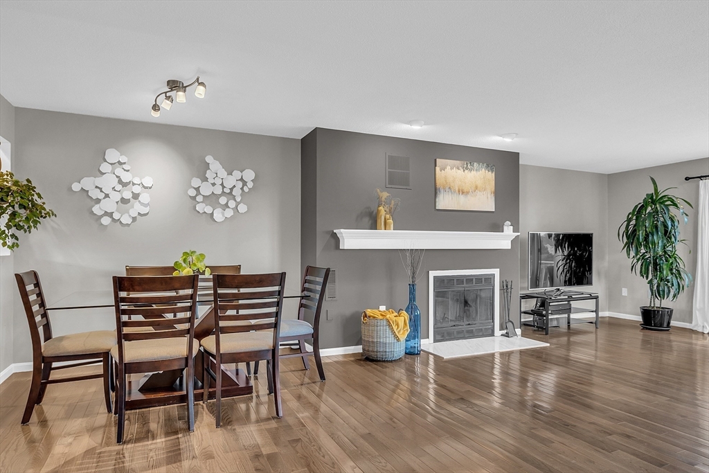 2 Countryside Lane, Unit 1301 Salem, MA 01970 - Photo 4 of 37 a view of a livingroom with furniture and a fireplace