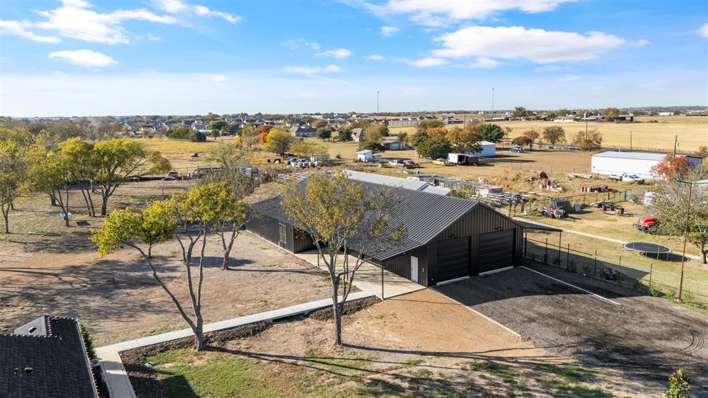 200 Corral Road Godley, TX 76044 - Photo 19 of 19 a view of a terrace with wooden floor and lake view