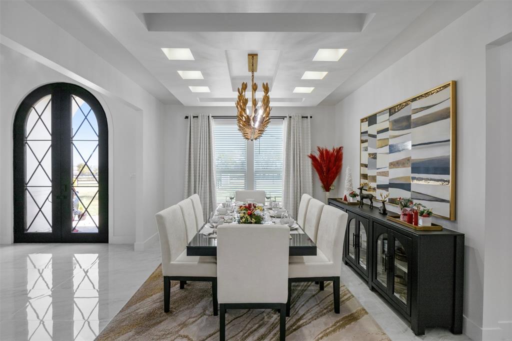 200 Corral Road Godley, TX 76044 - Photo 6 of 19 a view of a dining room with furniture a chandelier and window