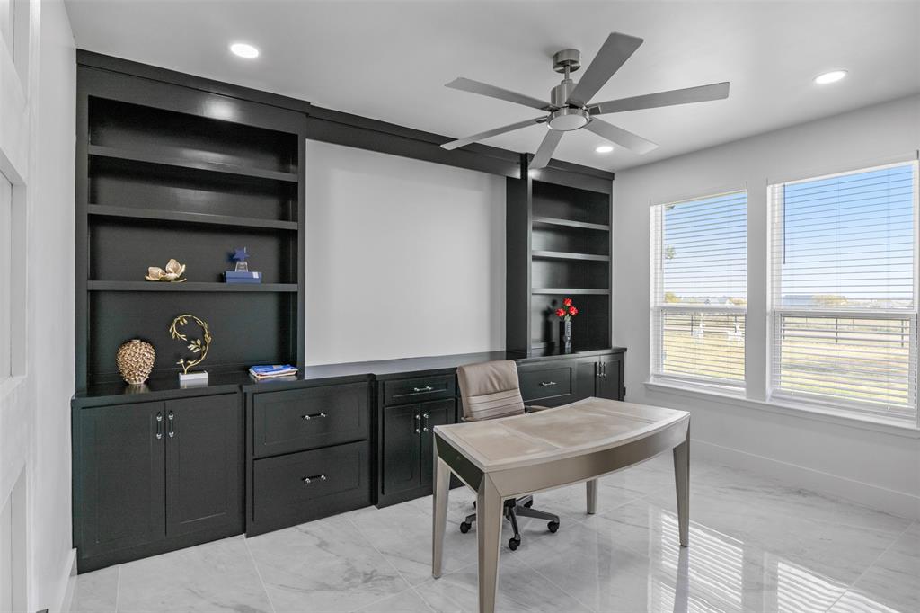 200 Corral Road Godley, TX 76044 - Photo 7 of 19 a workspace with furniture and a window