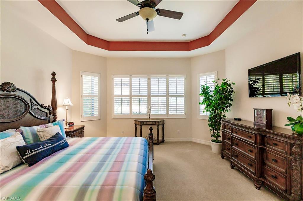 7684 Cottesmore Drive Naples, FL 34113 - Photo 27 of 46 a bedroom with furniture and a window