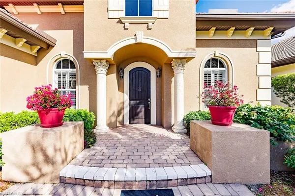 a front view of a house with a porch