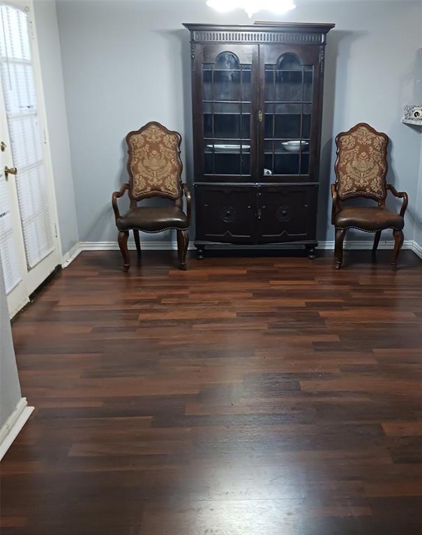 5750 Phoenix Drive, Unit 33 Dallas, TX 75231 - Photo 6 of 14 a living room with furniture and a wooden floor