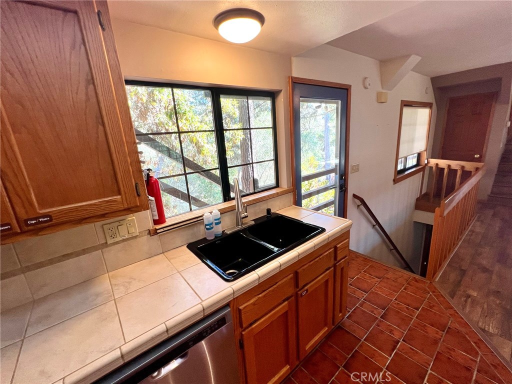 3151 Ramsey Road Cambria, CA 93428 - Photo 24 of 46 Stairs go down to the primary bedroom and ensuite full bath