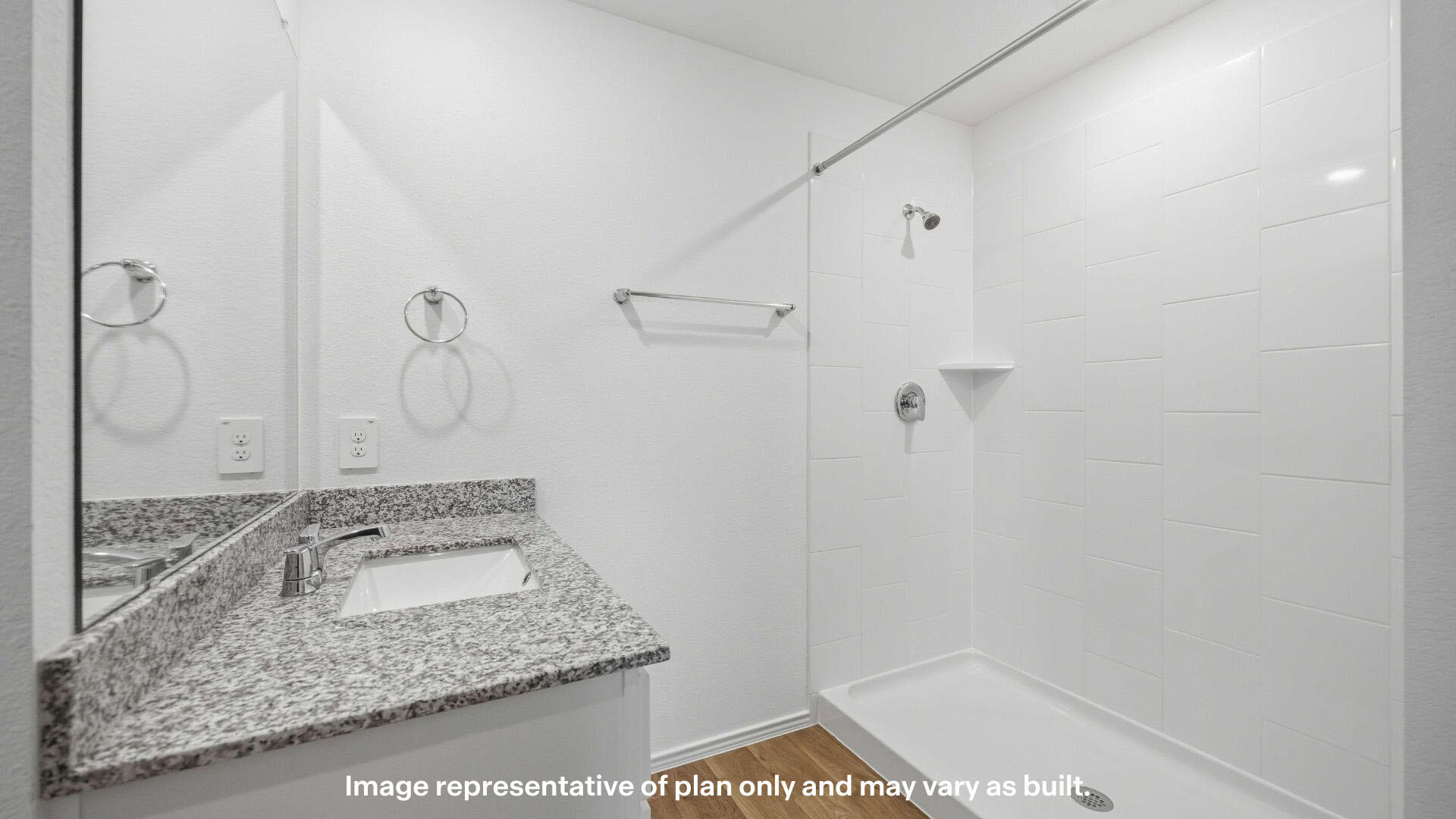 7441 10th Street Lubbock, TX 79416 - Photo 21 of 25 a bathroom with a granite countertop shower