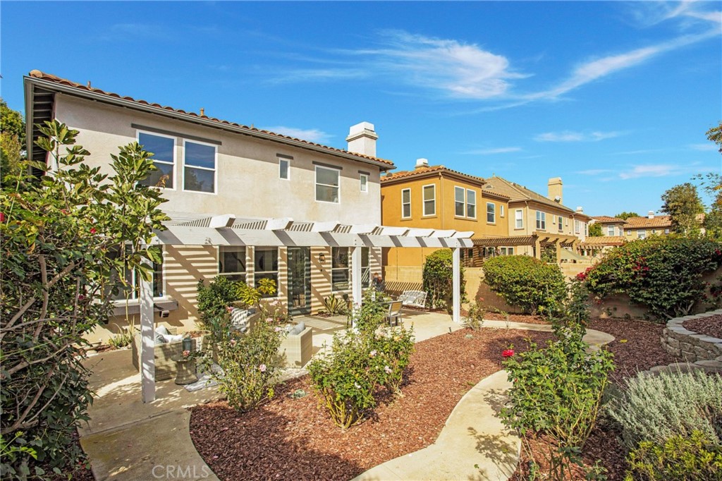 10 Bel Spring Irvine, CA 92602 - Photo 18 of 35 a view of a house with a yard
