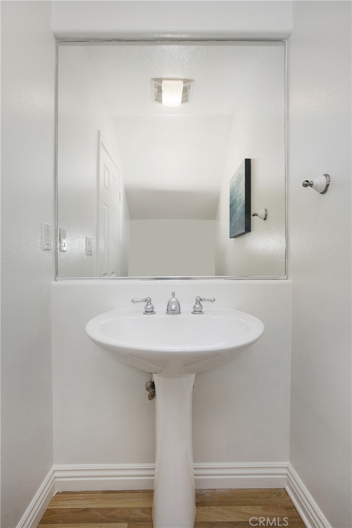 10 Bel Spring Irvine, CA 92602 - Photo 23 of 35 a bathroom with a sink and a mirror