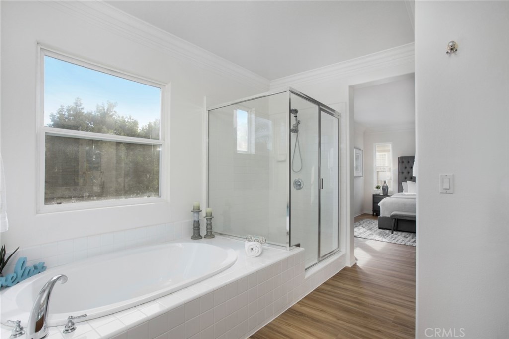 10 Bel Spring Irvine, CA 92602 - Photo 24 of 35 a bathroom with a tub a toilet and a shower