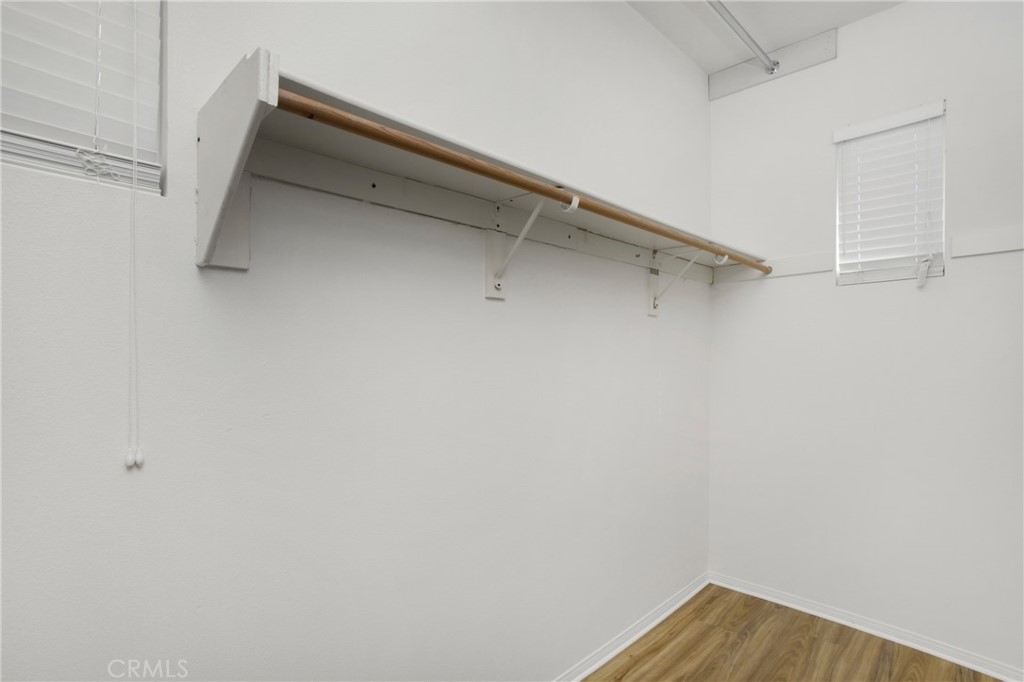 10 Bel Spring Irvine, CA 92602 - Photo 34 of 35 a view of walk in closet with empty racks