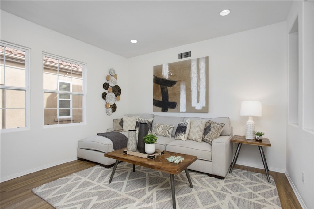 10 Bel Spring Irvine, CA 92602 - Photo 6 of 35 a living room with furniture and a window