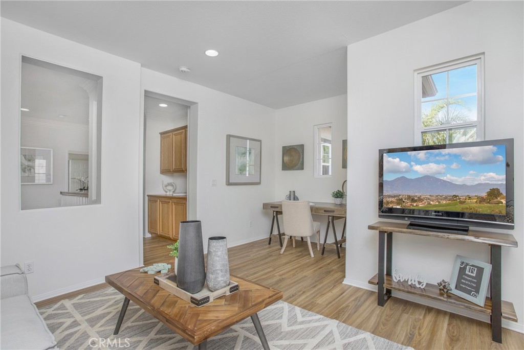 10 Bel Spring Irvine, CA 92602 - Photo 8 of 35 a living room with furniture and a flat screen tv