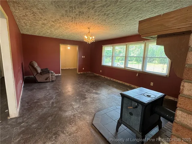 a workspace with furniture and window