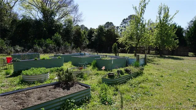 a garden view with a sitting space