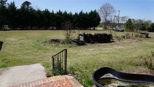 a view of an outdoor space and a yard