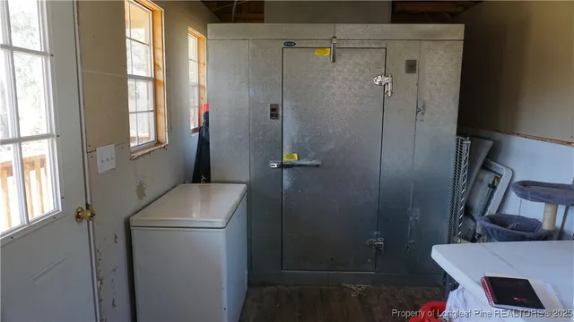 a bathroom with a shower toilet and sink