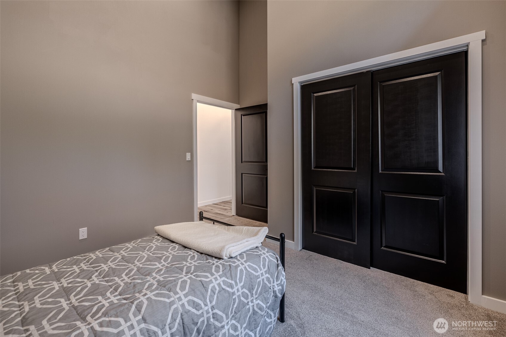 10642 Merry Canyon Road Leavenworth, WA 98826 - Photo 23 of 36 a bedroom with a bed and a closet