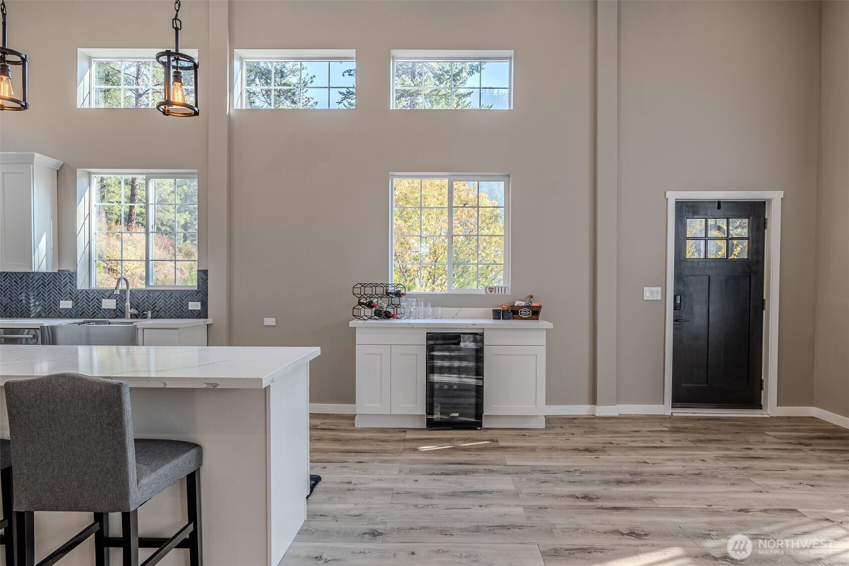 10642 Merry Canyon Road Leavenworth, WA 98826 - Photo 32 of 36 a view of kitchen with granite countertop cabinets and wooden floor