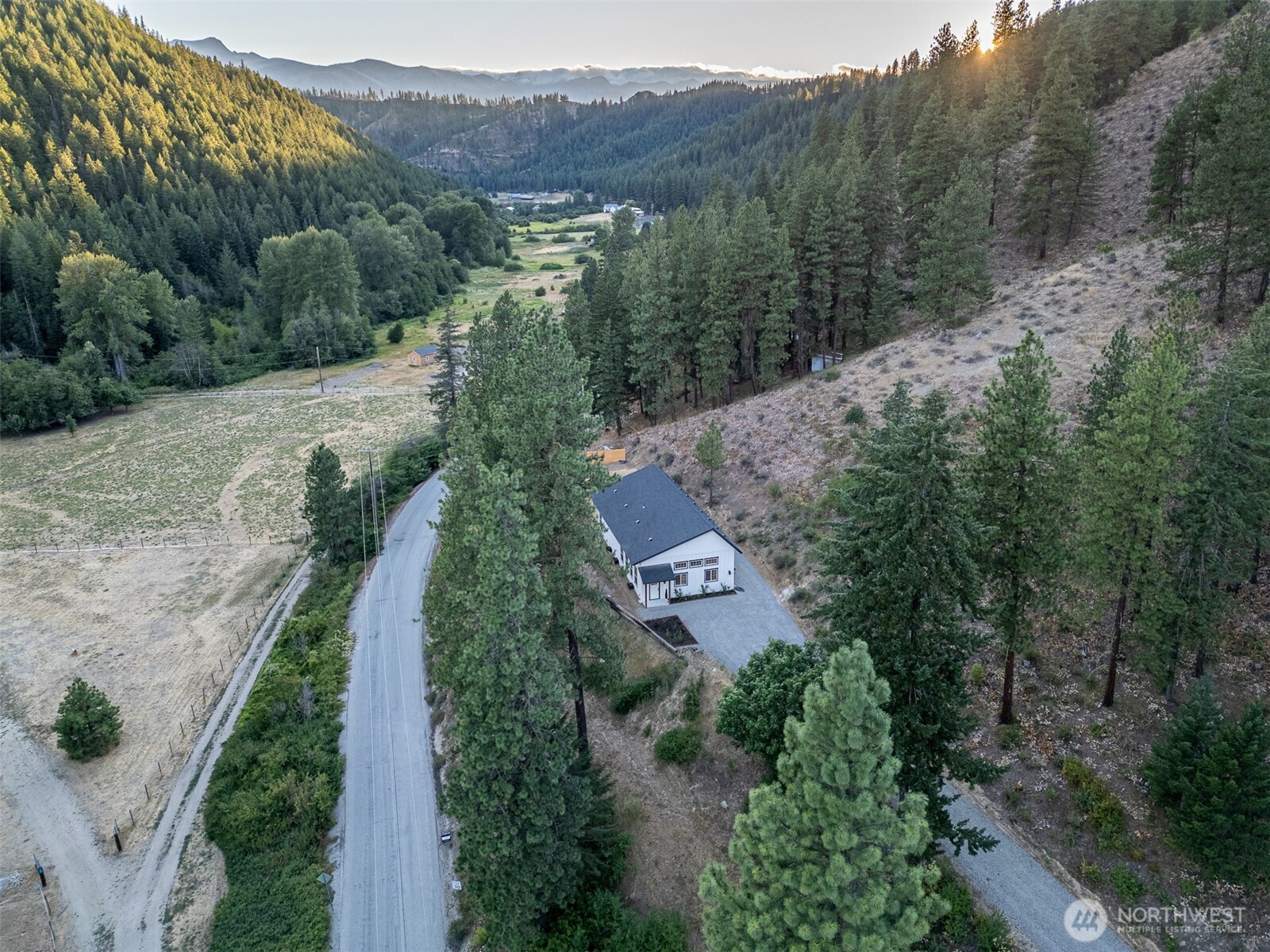 10642 Merry Canyon Road Leavenworth, WA 98826 - Photo 5 of 36 an aerial view of a city with lots of residential buildings