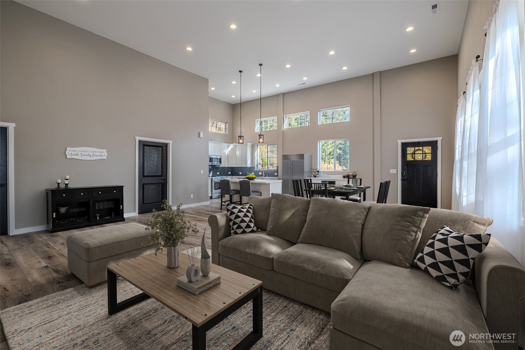 10642 Merry Canyon Road Leavenworth, WA 98826 - Photo 7 of 36 a view of a living room kitchen and a wooden floor