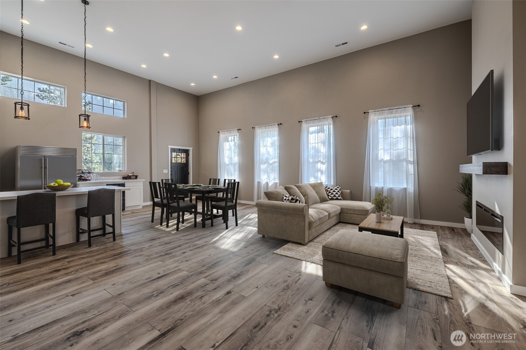 10642 Merry Canyon Road Leavenworth, WA 98826 - Photo 8 of 36 a living room with furniture and a flat screen tv
