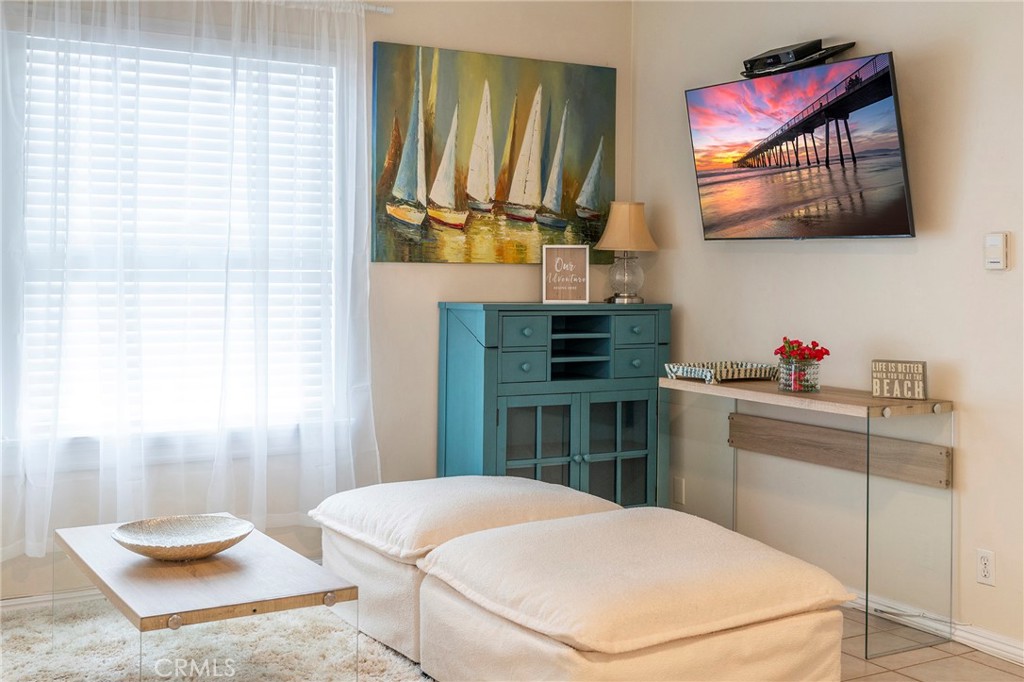 1728 The Strand, Unit 4 Hermosa Beach, CA 90254 - Photo 20 of 23 a kitchen with stainless steel appliances kitchen island granite countertop a refrigerator a stove a sink and dishwasher