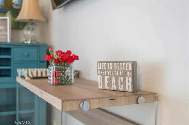 a bathroom with a sink a vanity and a window