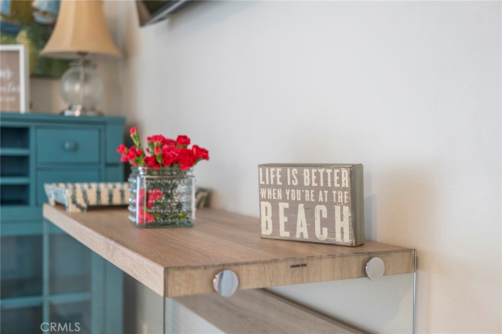 1728 The Strand, Unit 4 Hermosa Beach, CA 90254 - Photo 22 of 23 a bathroom with a sink a vanity and a window