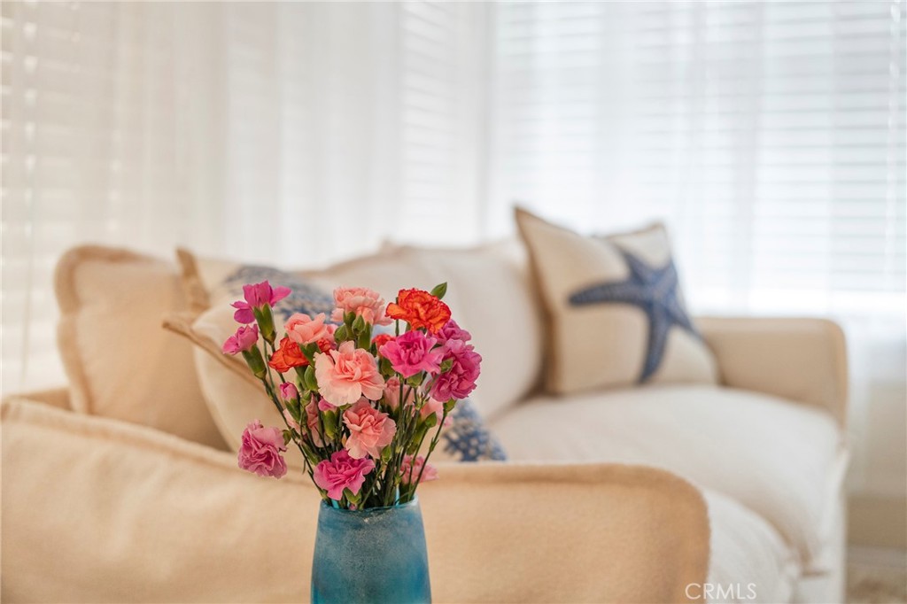 1728 The Strand, Unit 4 Hermosa Beach, CA 90254 - Photo 5 of 23 a vase of flowers sitting on a table