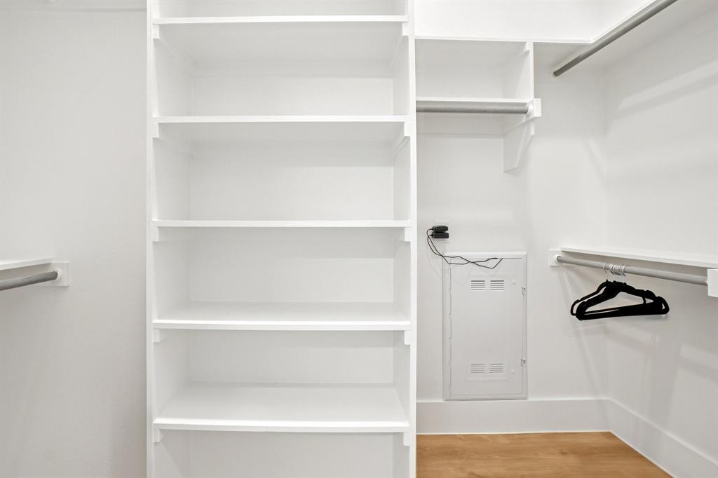 6418 Maple Avenue, Unit 302 Dallas, TX 75235 - Photo 14 of 16 a view of walk in closet with empty racks