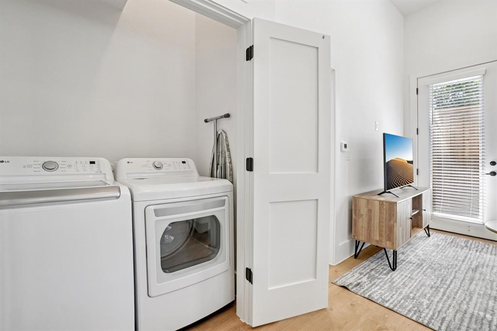 6418 Maple Avenue, Unit 302 Dallas, TX 75235 - Photo 8 of 16 a utility room with dryer and washer