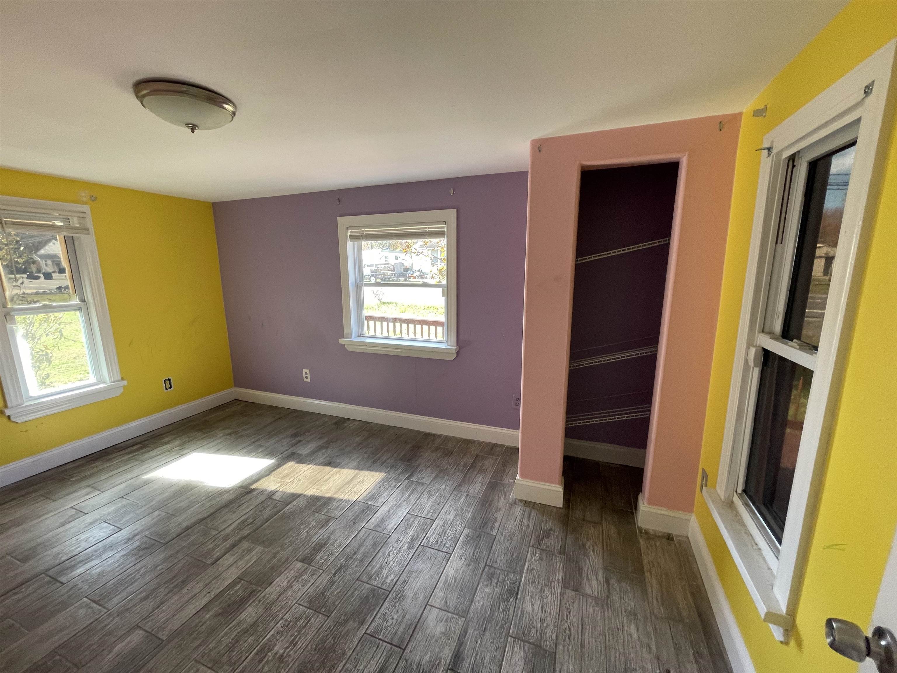 1658 North Port Norris, NJ 08349 - Photo 18 of 34 a view of an empty room with window and wooden floor