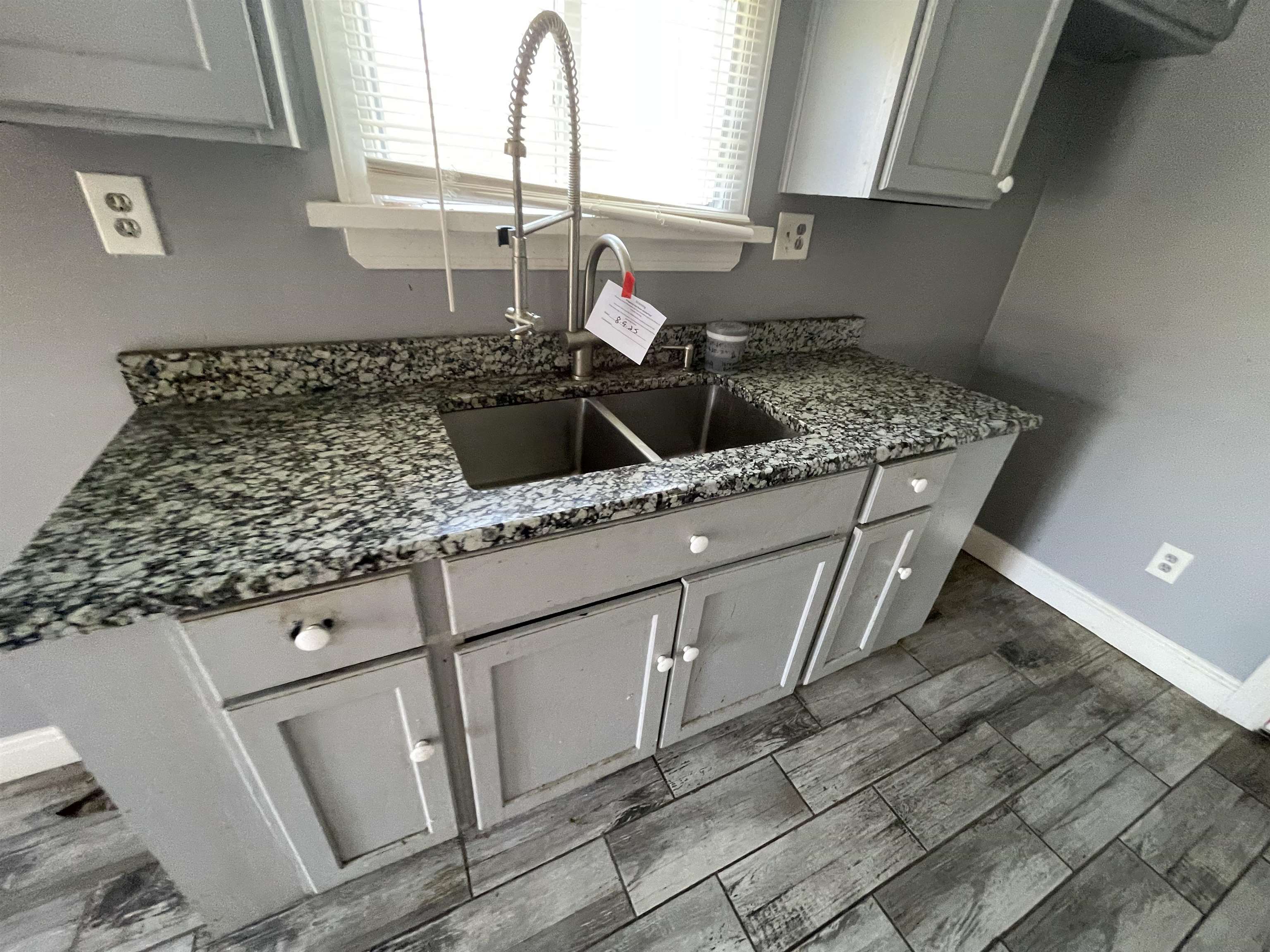 1658 North Port Norris, NJ 08349 - Photo 10 of 34 a kitchen with stainless steel appliances granite countertop a sink stove and cabinets