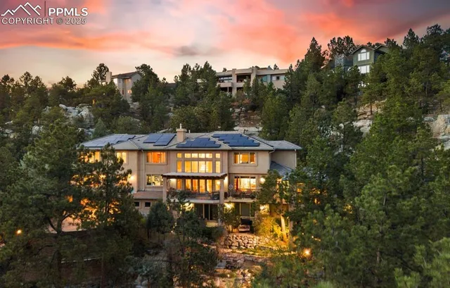 a view of a swimming pool with a yard