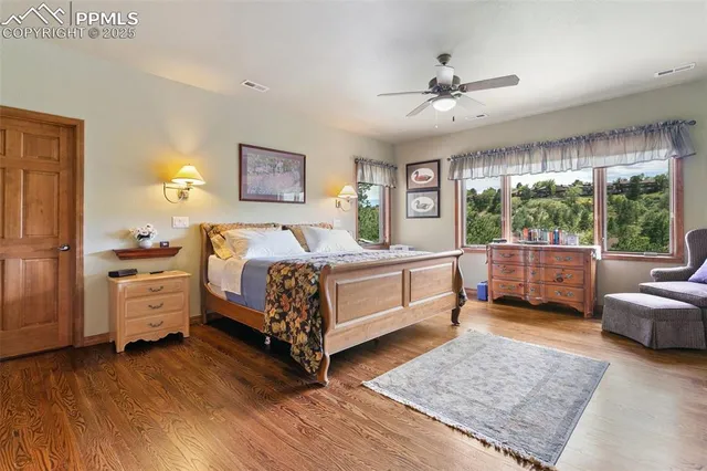 a bedroom with a bed and a couch