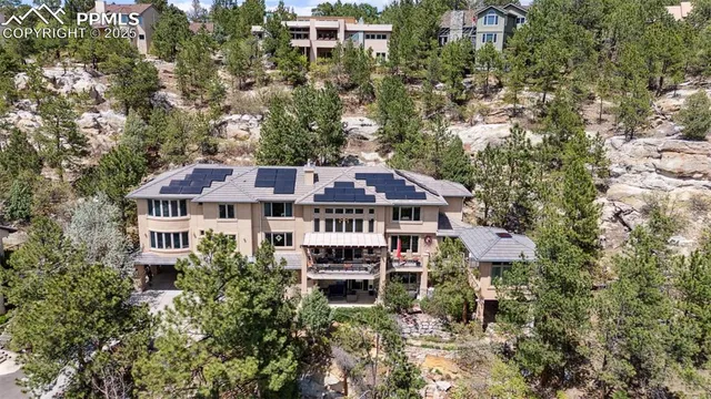 an aerial view of a house with a garden