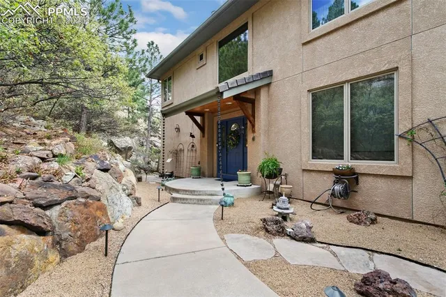 a building exterior with furniture