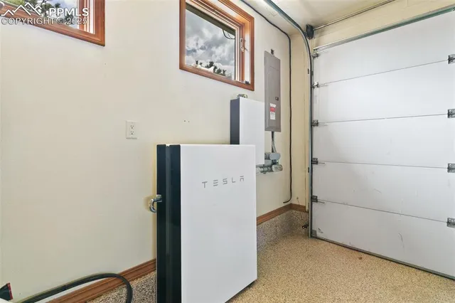 a view of a swimming pool with a yard and mountain view