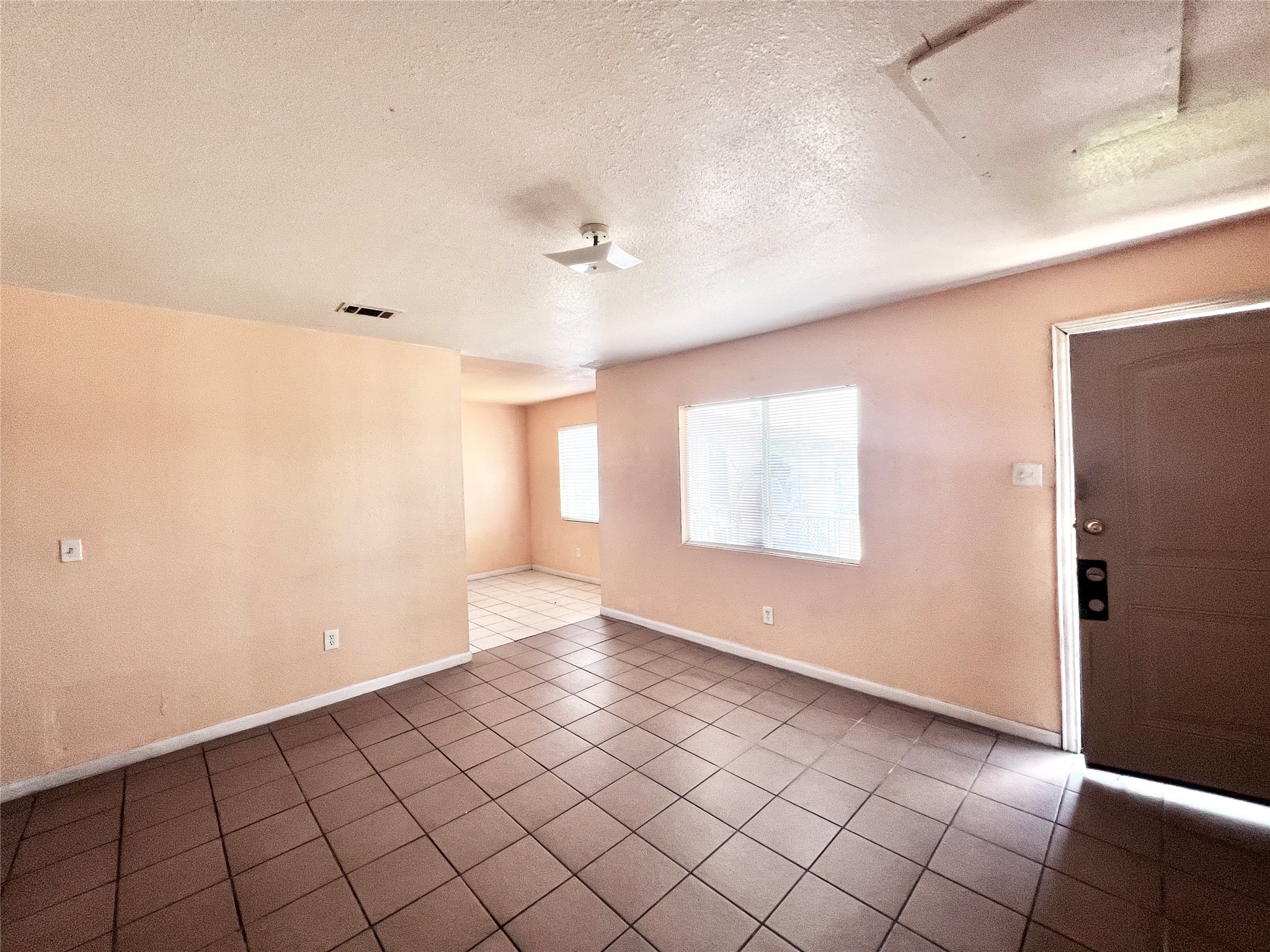 6802 Sayers Street, Unit A FEW Houston, TX 77016 - Photo 21 of 32 a view of an empty room and window