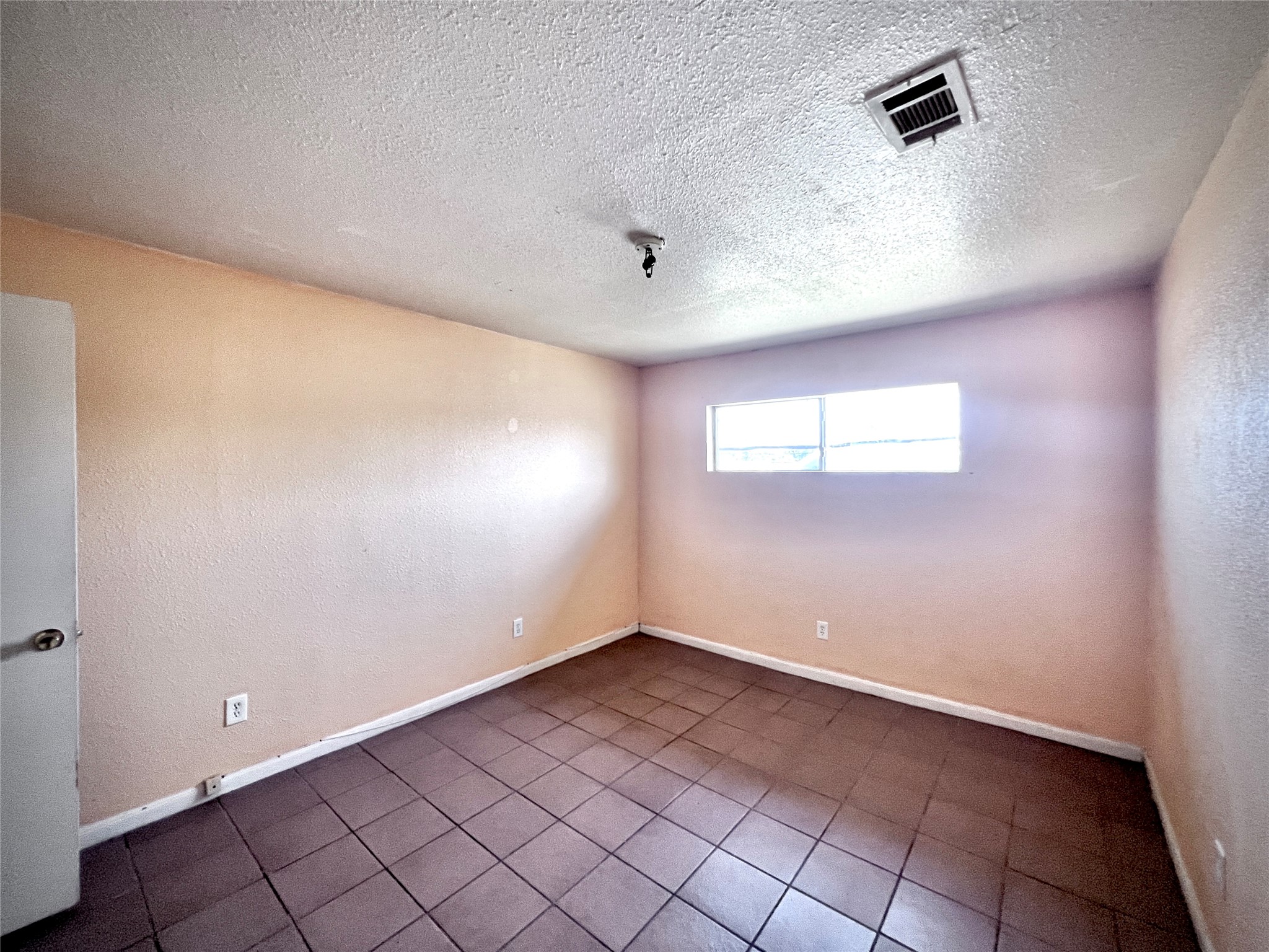 6802 Sayers Street, Unit A FEW Houston, TX 77016 - Photo 22 of 32 a view of an empty room