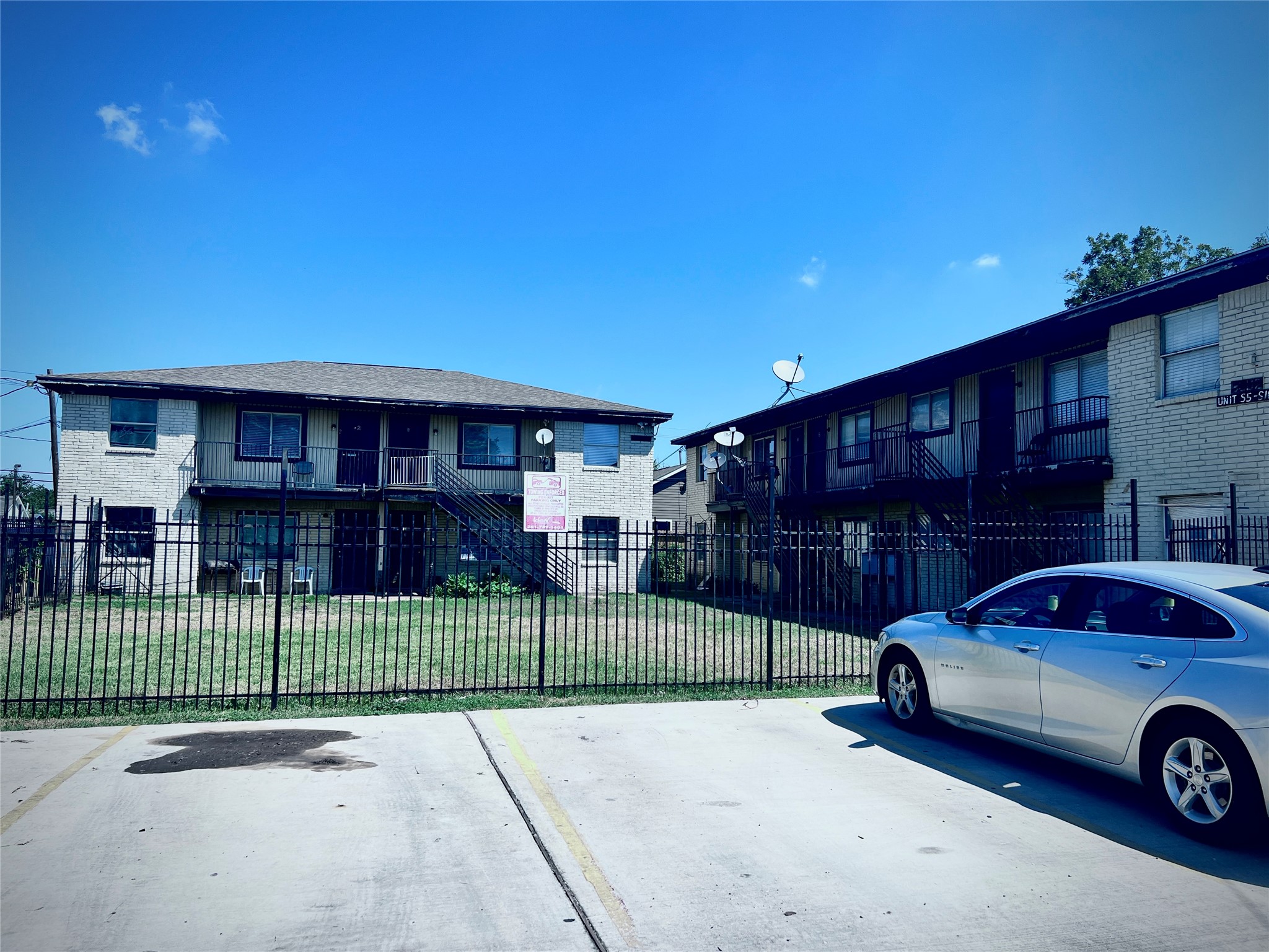 6802 Sayers Street, Unit A FEW Houston, TX 77016 - Photo 29 of 32 a car parked in front of a house