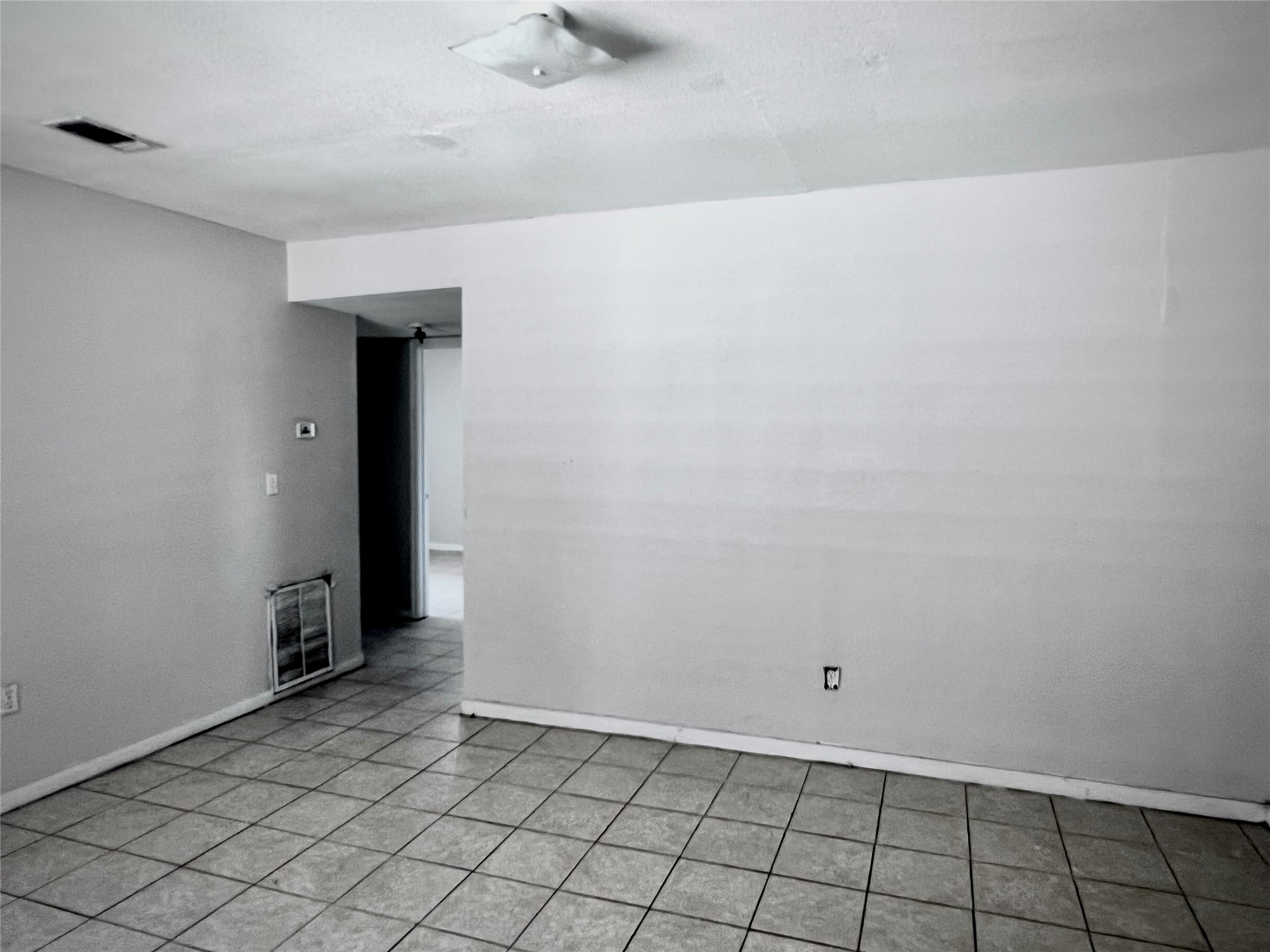 6802 Sayers Street, Unit A FEW Houston, TX 77016 - Photo 8 of 32 a view of an empty room