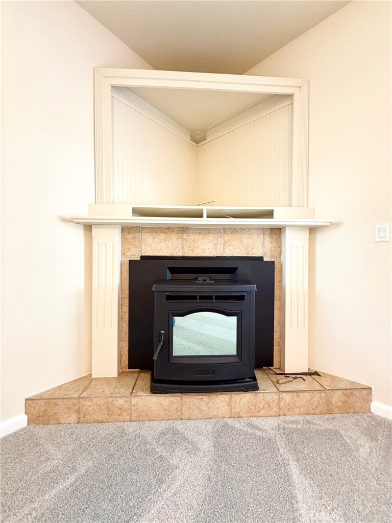 1037 Mark Twain Road Angels Camp, CA 95222 - Photo 13 of 52 a living room with a fireplace in it