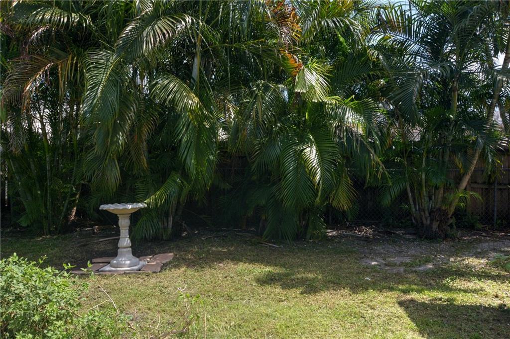 4340 Gulfstream Road Lake Worth, FL 33461 - Photo 6 of 23 a view of a backyard with fountain