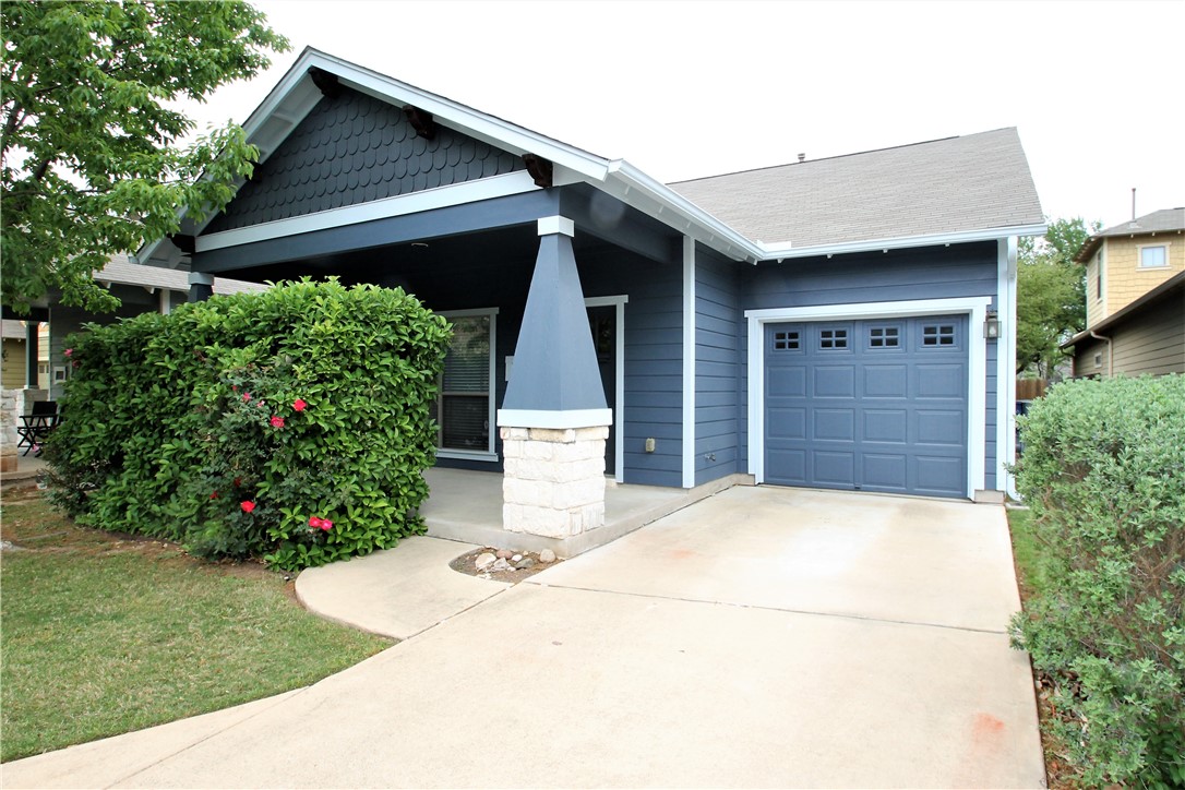 a house view with a backyard space