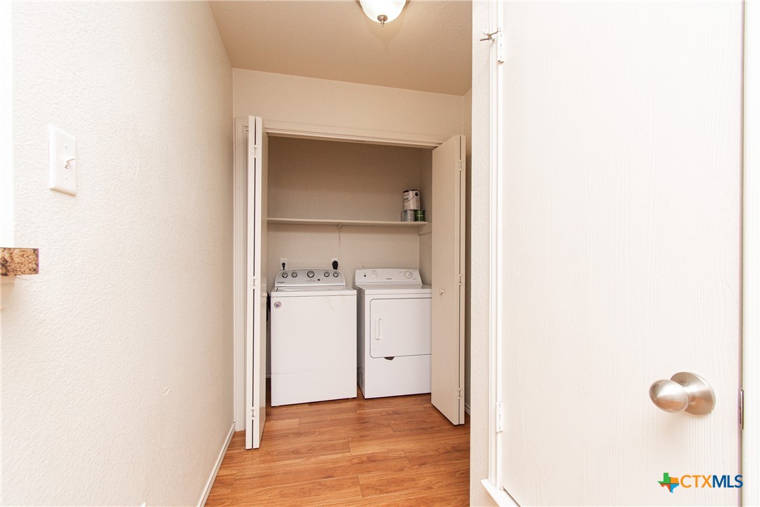 6509 Temora Loop, Unit A Killeen, TX 76549 - Photo 6 of 19 a view of a hallway with washer and dryer