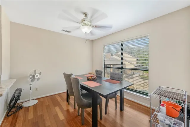 a workspace with furniture and a window