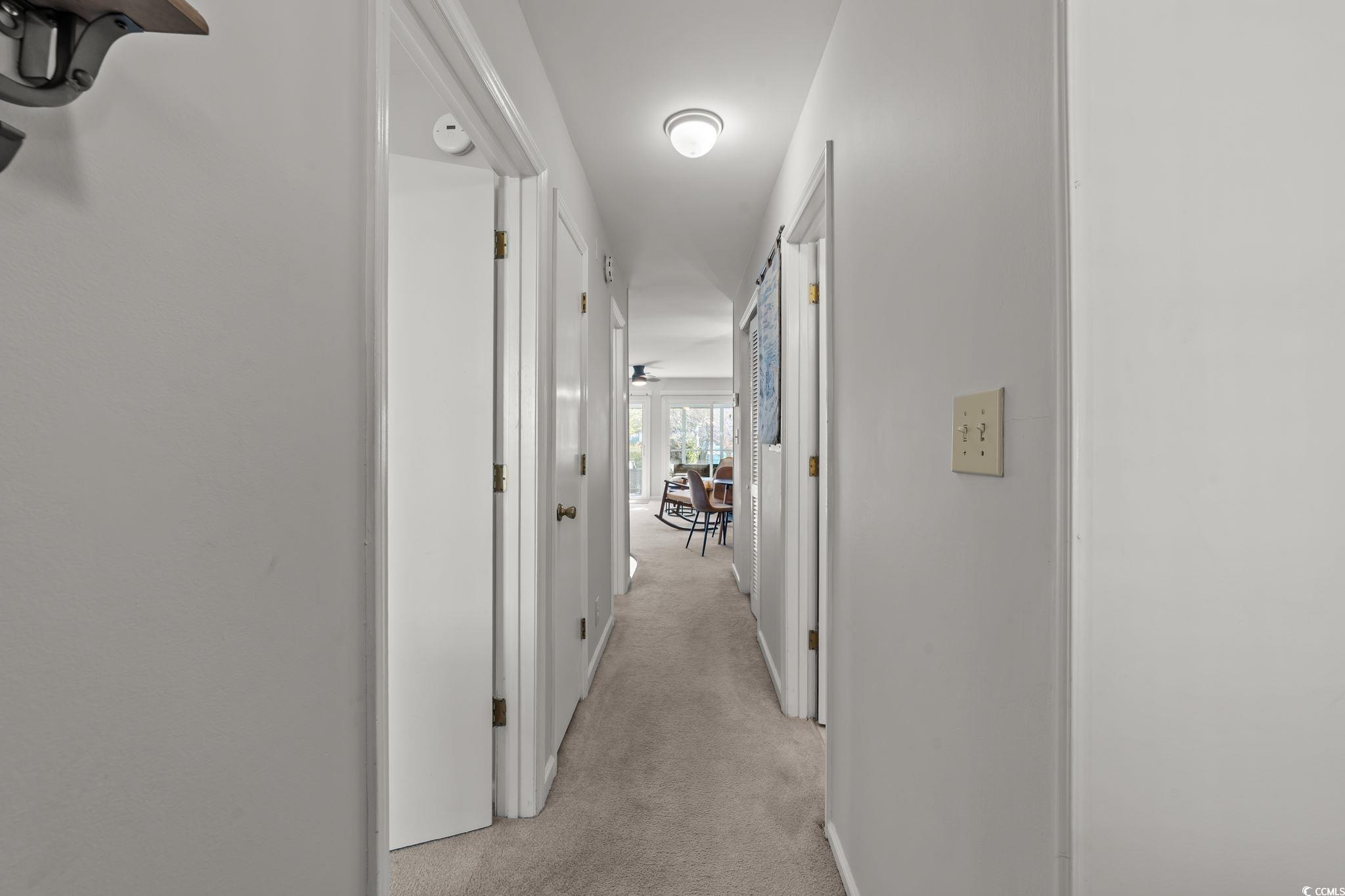 3700 Golf Colony Lane, Unit 2I Little River, SC 29566 - Photo 2 of 23 Hall featuring light colored carpet