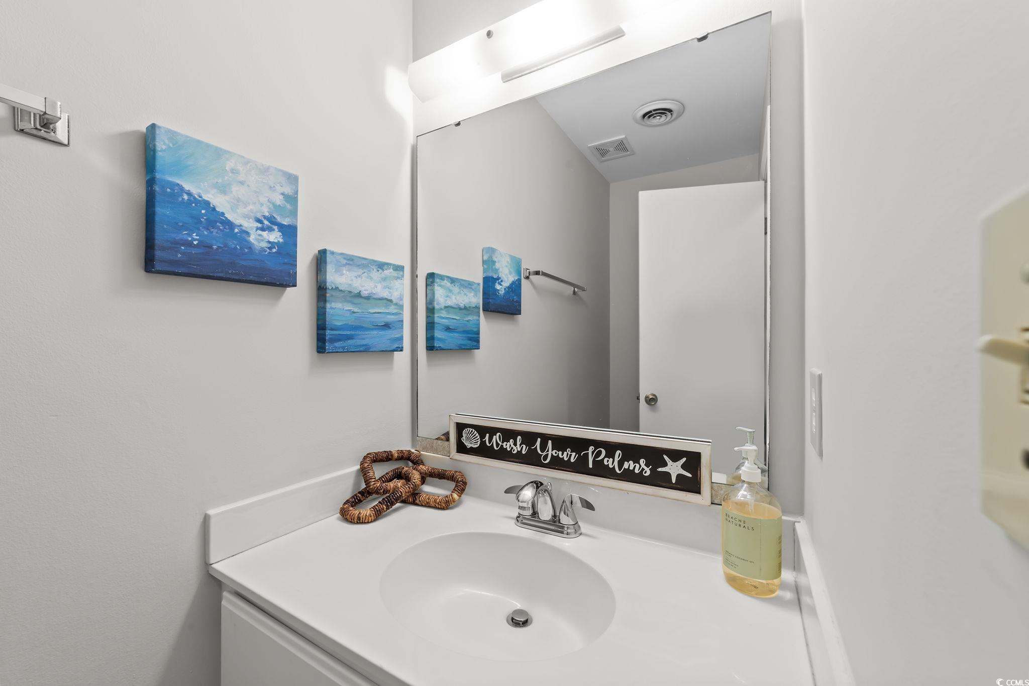 3700 Golf Colony Lane, Unit 2I Little River, SC 29566 - Photo 3 of 23 Bathroom with vanity