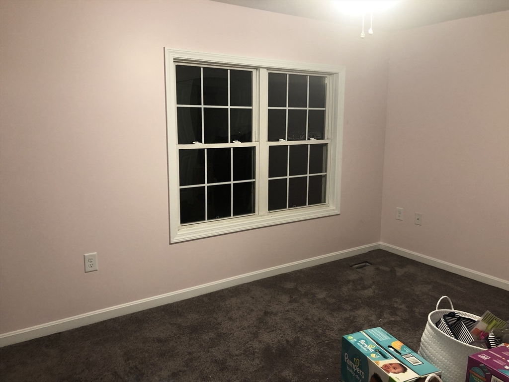 41 Boston Road, Unit 174 Billerica, MA 01862 - Photo 6 of 9 a view of an empty room with a window